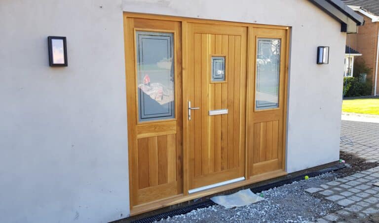 Why are solid timber doors considered better than veneer doors?
