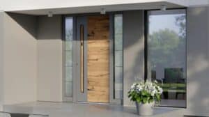 Modern home entrance with large glass doors and a wooden feature wall, complemented by a white flower arrangement on the front porch, showcasing contemporary architecture and design.